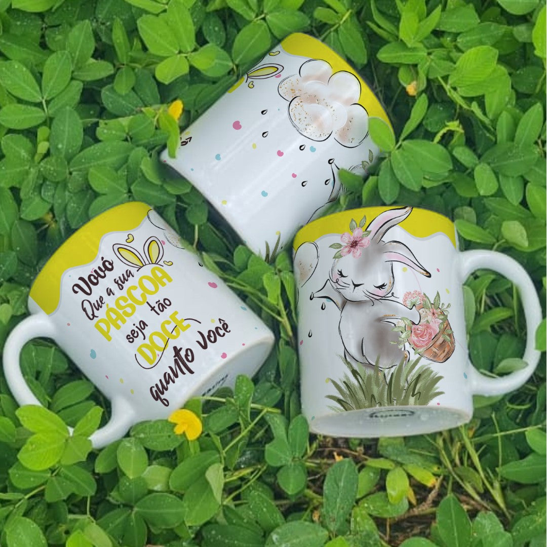 Three mugs with decorative designs on a grass background