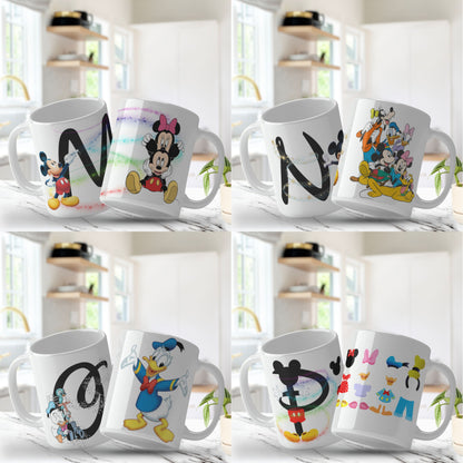 Set of Disney-themed mugs with character designs on a white surface.