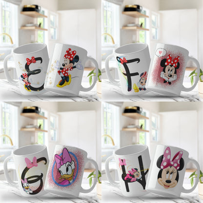Set of six white mugs with cartoon character designs on a white surface.