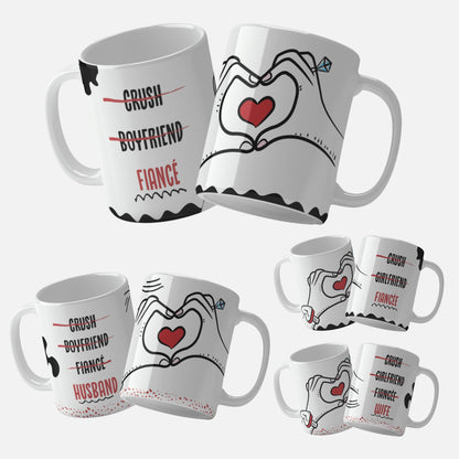 Husband_and_Wife_Mug_Set, Fiancé_and_Fiancée_Mug_Set, Set of two mugs with hands forming and Set of two mugs with hands forming a heart and a red heart in the center, labeled 'Fiancé' and 'Fiancée a heart and a red heart in the center, labeled 'Husband' and 'Wife